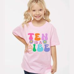 Ten is a Vibe Groovy Retro Birthday shirt, unique cute shirt to remember your little one's  Birthday!! Please read all the info before placing your order. The price you see is per shirt, please read the size chart in the last pictures of listings before placing your order. How to order a shirt: *Select the STYLE *Select the SIZE *Select the Quantity *Add Personalization *Add to cart *Go back and Repeat for each size (if you need more than one shirt) SHIRTS INFO: *Color:Pink, White, Natural 100% Funny Pink T-shirt For Spring, Pink Number Print T-shirt For Birthday, Fun Pink T-shirt For End Of School Year, Playful Pink T-shirt For Birthday, Pink Short Sleeve T-shirt With Number Print, Fun Pink T-shirt For Birthday, Fun Pink Birthday T-shirt, Pink T-shirt For Birthday In Summer, Pink Summer T-shirt For Birthday