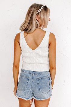 You are sure to have the biggest smile on your face when you complete your look with this adorable ivory colored top featuring lightweight and soft knit material, a v-cut neckline and upper back, 1-inch shoulder straps, and a flattering silhouette that ends in a straight ribbed hemline! Measurements S : Bust 28", Length 17.5", Waist 26". M : Bust 30", Length 18", Waist 28". L : Bust 32", Length 18.5", Waist 30". White Knit V-neck Tank Top, White V-neck Knit Tank Top, Knit V-neck Tank Top For Day Out, Chic Cream Knit Tank Top, Chic White Knit Tank Top, Fitted Cream V-neck Sweater Vest, Fitted Cream V-neck Tank Top, Fitted V-neck Cream Tank Top, Kids Athleisure