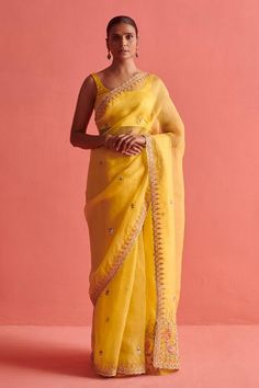 Yellow hand embroidered organza saree with mix of french knots and dabka work in tulip floral jaal pattern on pallu and border. Paired with a sleeveless matching mashru silk padded blouse and petticoat. - Aza Fashions Embellished Saree Blouse, French Tulip, Embellished Saree, Dabka Work, Organza Embroidery, Padded Blouse, Embroidered Organza, French Knots, Organza Saree