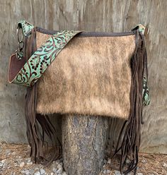 "Made of high quality soft leather & real cowhide Features 12″ long hand cut fringe 1 inside pocket - 1 outside pocket 2″ wide leather strap - 45\" length Approx bag measurements: 13″ x 13\" x 6\" Zipper closure *If you want a short shoulder strap, please write the length you want in the note to seller box at checkout" Fringe Handbags Purses, Western Bag, Fringe Handbags, Vintage Leather Bag, Bag Measurements, Brown Crossbody, Boho Purses, Brown Leather Bag, Mom Christmas