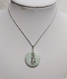 Brand New Jadeite Jade harmony (Luck) pendant necklace in sterling silver L45cm/40cm  Material: Genuine Myanmar jadeite jade, sterling silver marked  colour: Silver, green Size: L45cm/40cm, Jade size: 2.2-2.5cm  Remark: Item as shows in the pictures, brand new in plastic bag  if you have any question, please  send me message, I would like to answer you question without hesitation. Thanks. Payment Please pay for it within three days after you bid our item, thank you very much. We accept PayPal on Jade Gemstone Round Pendant Necklace, Silver Jade Round Necklace, Silver Round Jade Necklace, White Gold Jade Round Necklace, Silver Jade Round Jewelry, White Gold Jade Pendant Jewelry, Silver Jade Round Pendant Jewelry, Silver Jade Gemstone Necklace, Lovely Necklace