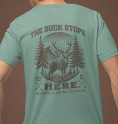 Introducing our unique "The Buck Stops Here T-Shirt"! This eye-catching shirt is perfect for the nature lover or outdoor enthusiast in your life. Made from high-quality cotton material, this t-shirt is not only stylish but also comfortable to wear all day long. The bold design features a majestic buck, making it a standout piece in any wardrobe. Whether you're hitting the trails or lounging at home, this t-shirt is sure to be a favorite. Add a touch of wildlife charm to your everyday look with o Green T-shirt For Outdoor Activities, Green Graphic Tee For Outdoor, Outdoor Green T-shirt With Graphic Print, Green Graphic Print Outdoor T-shirt, Green Graphic Print T-shirt For Outdoor, Green Printed T-shirt For Outdoor Activities, Outdoor Cotton Shirt With Sublimation Print, Green Graphic Print Shirt For Outdoor, Green Graphic Print Outdoor Shirt