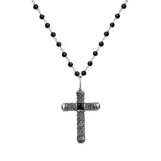 The "Profound Belief - Silver Matte Onyx Cross Charm Necklace" symbolizes the inner strength we receive from our faith as we enter new phases of our lives. Matte Onyx stones will encourage compassion for yourself and others and enhance your innate healing abilities. The sacred Cross knows how to put your soul in the needed flow for gaining the traits you've always wanted: altruism, long-lasting faith, and increased empathy. This way, you build more meaningful relationships and start to respect quality over quantity in every aspect of your life. 925 Oxidized Sterling Silver  4 mm Matte Onyx Stone  Care Guidelines Avoid contact with water, chemicals and perfumes as these may cause tarnishing and discoloration. Clean gently with a dry, non-abrasive cloth. Black Sterling Silver Necklace, Black Crucifix Necklace Engraved, Black Engraved Crucifix Necklace, Black Engraved Cross Pendant Necklace, Black Sterling Silver Spiritual Necklace, Black Engraved Pendant Cross Necklace, Black Spiritual Sterling Silver Necklace, Black Sterling Silver Cross Necklace, Black Spiritual Cross Pendant Necklace