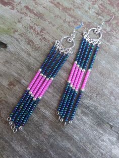 These multi strand beaded earrings feature blue and pink seed beads. Pink Dangle Beaded Earrings With Spacer Beads, Bohemian Pink Earrings With Spacer Beads, Beading Ideas, May 21, Blue And Pink, Multi Strand, Diy Jewelry Making, Beaded Earrings, Favorite Jewelry