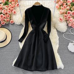 Black two pieces dress black knitted sweater + woolen sleeveless dressFabric: blendedColor: blackSize(cm): M, LSweaterlength 53 bust 70-94 sleeve length 56Dress&ltp&gtM length 97 bust 84 waist 78&lt/p&gt&ltbr/&gt&ltp&gtL length 98 bust 88 waist 82&lt/p&gt&ltbr/&gt Winter Black Long Sleeve Dress, Black V-neck Sweater Dress For Evening, Black Solid Color Winter Dress, Black A-line Winter Dress, Black Knee-length Winter Dress, Elegant Fitted Solid Color Sweater Dress, Winter A-line Midi Dress For Night Out, Knee-length Black Sweater Dress For Fall, Black Knee-length Sweater Dress For Winter