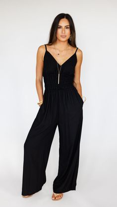 Stand out in this stunning jumpsuit, made to flow with buttery soft rayon and an exaggerated wide pant leg. Features adjustable straps and a gentle smocked waist to flatter. Fabric & Care Instructions:100% RayonHand wash cold Line dry Chic Jumpsuits And Rompers With Elastic Waistband For Loungewear, Chic Jumpsuit With Elastic Waistband For Loungewear, Chic Loungewear Jumpsuits And Rompers With Elastic Waistband, Chic Loungewear Jumpsuits With Elastic Waistband, Sleeveless Jumpsuits And Rompers With Smocked Back For Loungewear, Sleeveless Jumpsuits And Rompers For Loungewear With Smocked Back, Sleeveless Jumpsuits And Rompers For Loungewear, Black Wide Leg Jumpsuits And Rompers For Loungewear, Black Wide Leg Jumpsuits For Loungewear