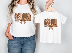 Celebrate the season of togetherness with our "Fall Mama and Mini" matching shirts! Perfect for cozy fall outings and festive gatherings, these shirts feature charming designs that capture the essence of autumn. HOW TO ORDER 1.Review the size chart and product photos. 2.Select your size and color from the dropdown menus. 3.Click 'ADD TO CART' and adjust quantity if needed. PRODUCT DETAILS *Comfort Colors 100%  ringspun cotton *Relaxed fit, unisex sizing (size up for an oversized fit) *Available Mama And Mini Shirt, Mama And Mini Shirts, Mini Thanksgiving, Fall Outings, Mini Shirts, Mama And Mini, Thanksgiving Tee, Mommy And Me Outfits, Mini Pumpkins