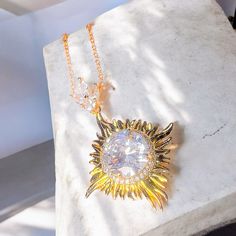 A statement necklace with a big dazzling crystal in the center makes a unique gift this christmas season Aesthetic Christmas Gift Ideas, Crystal Jewelry Necklaces, Necklace Aesthetic, Sun Necklace, Aesthetic Christmas