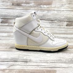 Nike Air Force 1 Sky Hi Dunk Womens 6.5 High Top White Wedge Sneakers 644877-101 Size: Women's Size 6.5 US Condition: Shoes are in fair/good condition; will show normal cosmetic wear from general use but nothing significant. Please review all photos for condition details. White Wedge Sneakers, Nike Fashion, Sneaker Wedge, Wedge Sneakers, Athletic Fashion, Nike Dunk, Nike Air Force 1, Nike Dunks, Air Force 1