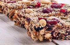 granola bars with cranberries and nuts on top