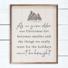 a wooden sign with the words as we grow older, our christmas list becomes smaller and the things we really want for the holidays can't be bought