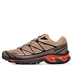 * Synthetic/Textile upper   * Molded OrthoLite® insole   * Quicklace™ lacing system   * Lace pocket   * Full-length Agile Chassis™ System   * Abrasion-resistant TPU   * EVA Midsole   * Mud Contagrip®   * Rubber outsole   * Color: Hazelnut/Quail/Living Coral   * Style: L4744490028 Brown Lace-up Running Shoes With Boost Midsole, Dynamic Synthetic Lace-up Trail Running Shoes, Sporty Brown Trail Running Shoes With Vibram Sole, Sporty Breathable Brown Trail Running Shoes, Sporty Brown Breathable Trail Running Shoes, Functional Brown Running Shoes With Round Toe, Breathable Brown Trail Running Shoes, Brown Low-top Outdoor Running Shoes, Brown Breathable Sneakers For Running