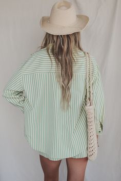 Green and yellow striped long sleeve button up collared top Material is Polyester Lay flat to dry Model is 5'9 wearing a small SHOP THE LOOK Small Medium Large Length 28" 29" 30" Bust 23.5" 24.5" 25.5" Wedding Guest Romper, Party Bottoms, Collared Top, Jumpsuit Skirt, Denim Romper, Collar Top, Shop The Look, Maxi Dress Party, Romper Dress