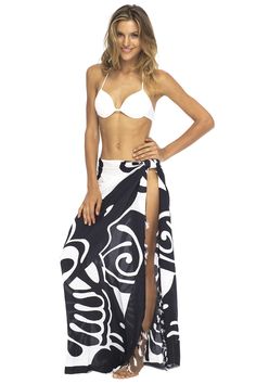 This lightweight and lovely fringed black pareo lifts your spirits and lightens your vibe, combining bold batik-like strokes with the magical effervescence of a butterfly. Wear as a sarong dress, wrap skirt or sexy swimwear cover up; just pull the ends through the natural coconut shell buckle and cinch to create your own personal beach, pool or vacation look. You can also use it as a lightweight beach blanket or stunning wall hanging. Back From Bali is dedicated to creating beautiful, quality cl