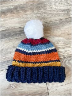 This striped hat was inspired by a GAP sweater worn by one of my own children. I love the fun combination of colors! It's perfect for an impromptu snowball fight, sledding/skiing with family and friends, or walking across campus. Made of wool blend yarn, this hat is one of the warmest I make! This hat can be customized with any colors you use, from pastels, to fall colors, or Christmas colors, it is sure to be a fun stylish hat you reach for again and again. A sweet customer sent me a sketch of Striped Winter Hats One Size Fits Most, Winter Striped Hats One Size Fits Most, Playful Multicolor Hats For Cold Weather, Fun Multicolor Winter Hats, Fun Multicolor Crochet Hat For Winter, Fun Multicolor Warm Hat, Warm Fun Multicolor Hats, Striped Hat, Beige Hat