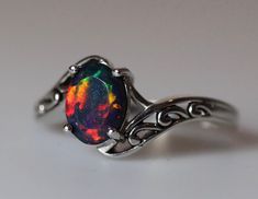 This Anniversary Rings item by KissedByFireJewelry has 3030 favorites from Etsy shoppers. Ships from Hollywood, FL. Listed on Sep 28, 2023 Fire Opal Engagement Ring, Black Fire Opal, Opal Ring Vintage, Vintage Silver Jewelry, Black Opal Ring, Cute Engagement Rings, Opal Wedding Rings, Fire Opal Ring, Magical Jewelry