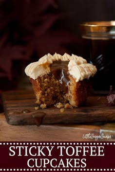 a close up of a cupcake on a wooden table