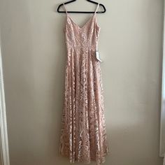 Pink Shimmering Lace Dress Pink A-line Lace Dress, Spring Pink Lace Maxi Dress, Pink Lace Maxi Dress For Spring, Pink Spring Midi Dress For Prom, Pink Midi Dress For Prom In Spring, Pink Midi Dress For Spring Prom, Spring Pink Maxi Dress For Formal Occasions, Pink Sleeveless Lace Maxi Dress, Pink A-line Maxi Dress For Prom