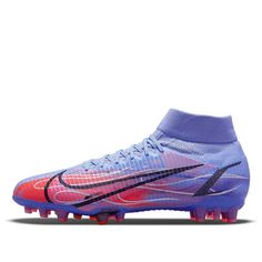 the nike superfly football shoe is shown in blue and pink