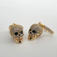 18K gold filled skull and huggie hoops, tarnish resistant, paved with cubic zirconia, shines like a dream.  Also available in the white gold filled, Please select desired finish in drop down menu.  1" drop down length, skull is 0.5" by 0.2" Gold Skull-shaped Earrings, Gift For Mom Birthday, Women Choker Necklace, Goth Earrings, Minimalist Earrings Gold, Dainty Hoop Earrings, Gold Skull, Earrings Halloween, Gothic Earrings