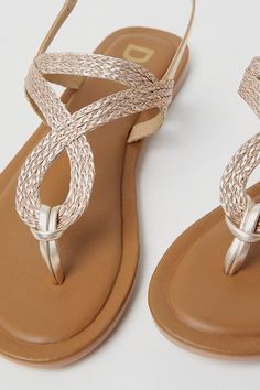 Chic leather thong sandals with intricate rope detailing
Flat sole offers all-day comfort and versatility
Toe-post design with slingback strap for a secure fit
Stylish yet practical for warm-weather occasions
Effortless slip-on style for easy on and off
Exude relaxed elegance with these leather thong sandals from Dorothy Perkins. The intricate rope detailing adds a touch of bohemian flair, while the flat sole ensures comfort for all-day wear. Ideal for dressing up or down, these sandals can seamlessly transition from brunch with friends to an evening baby shower. Pair them with a breezy sundress or tailored shorts for a chic, warm-weather look that radiates effortless style. Toe Thong Sandals, Occasion Dresses Wedding Guest, Relaxed Elegance, Leather Thong Sandals, Chic Leather, Tailored Shorts, Pierced Jewelry, Post Design, Fit N Flare Dress