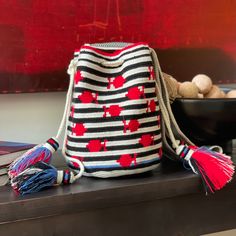 a purse sitting on top of a wooden table