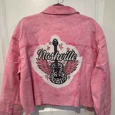 Nwt Nashville Guitar Tshirt Upcycled Crop Pink Jean Jacket 2x. Bust Is 28 Inches Ptp And Length Is 21 Inches. Custom Made Using Two Shirts So The Cost Is More. I Go Out N Hunt N Source These Flannels N Tshirts Or Source Online And Create Unique One Of A Kind Pieces Of Art Thst You Will Have Forever. They Are Great Conversation Pieces And Usually Have A Lot Of Meaning As The Artist Or Song Can Spark Our Soul. These Types Of Shorts Sell At Fairs For $75 N Up So I Try To Offer Great Prices. If You’ Urban Style Pink Tops For Spring, Urban Pink Tops For Spring, Pink Band Merch Top For Fall, Pink Jean Jacket, Types Of Shorts, Pink Jeans, Jean Coat, Jean Jacket, Nashville