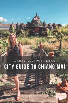 a woman standing on a bridge with the words wanderlust with las's city guide to change mai