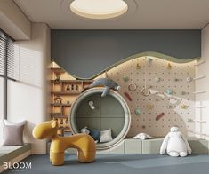 there is a child's room with climbing walls and toys on the floor in front of it