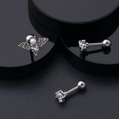 One package includes three pieces cartilage earring. Gauge: 16g(1.2mm) Bar Length: 6mm Ends Ball Diameter: 4mm Material: 316L Surgical Stainless Steel One package contains 3pcs cartilage earrings: ghost design, bat design, round zircon design. This cartilage earring is made of 316L Stainless Steel, Nickel Free, Healthy for Sensitive Skin. Dainty ghost and bat Design could show personal characteristics, also is an ideal gift for friend on Halloween day(as Halloween Jewelry), Christmas. You can ch Conch Earrings, Conch Stud, Ghost Bat, Bat Design, Minimalist Earring, Tragus Earring, Cartilage Stud, Conch Earring, Ghost Design