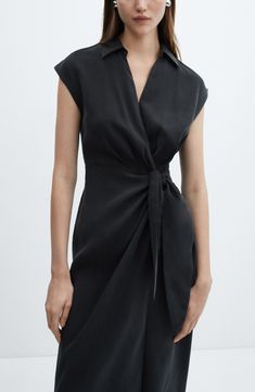 Set out from the office to nights on the town in this versatile wrap dress that's topped with a sleek and sophisticated collar. True wrap style with side tie closure Johnny collar Cap sleeves Unlined 83% modal, 17% polyester Machine wash, line dry Imported Evening Wrap Dress With Short Sleeves And Faux Wrap, Chic Midi Dress With Surplice Neckline And Tie Waist, Chic V-neck Wrap Dress For Office, Date Night Midi Wrap Dress With Tie Waist, Formal V-neck Faux Wrap Dress, Chic Wrap Dress For Office, Knee-length Wrap Dress For Office, Elegant Viscose Dress With Surplice Neckline, Evening Wrap Dress With Tie Waist And Short Sleeves