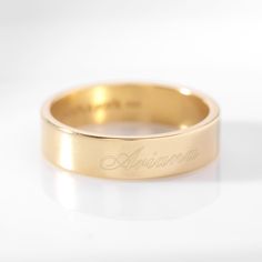 Create a classic piece with our Aria Name Ring. Have your name or the name of someone you love custom engraved for a completely unique piece of jewelry. Available in 14k gold plated, rhodium plated or 14k rose gold plated sterling silver Band width: 6 mm With engraving this item is FINAL SALE Protected with an anti-tarnish barrier SKU: BYR1025 Aria Name, Stacked Rings, Jewelry Staples, Name Ring, Name Rings, Fine Ring, Gifts For Your Girlfriend, Personalized Rings, Classic Ring