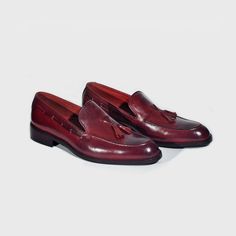 Handmade Burgundy Color Original Calf Leather Stylish Apron Toe Slip On Tassel Loafers Shoes For Men's ❤ Upper Material👉 Genuine Leather ❤ Inner Linings👉 Soft Leather ❤ Style👉 Loafers ❤ Color👉 Burgundy ❤ Sole👉 Leather ❤ Gender👉 Male ❤ Heel👉 Leather ❤ Totally Hand stitched 👍 Manufacturing Time 7 to 10 Business Days Accessories may differ Sometime a little from original picture due to availability Colored rubber out sole extends durability and longevity of these striking men's dress shoes LOAFER These comfortable slip-on shoes were invented at the turn of the 20th century and are considered offshoots of moccasins. The shaft of the loafer continues down under the length of the foot and is sealed on top with a vamp insert. Loafers also feature an outsole and a heel. CALF Skin This shoe Mens Tassel Loafers, Loafer Shoes For Men, Custom Design Shoes, Leather Boot Shoes, Tassel Loafers, Burgundy Color, Loafers Men, Leather Heels, Leather Fashion