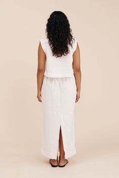 Cut from our signature linen, The Emma Pencil Skirt is designed to sit high on the waist and is such a chic option for both day and evening wear. It turns to reveal a stunning centre split at the back. Wear yours as a set with the matching Martina Crop Top. High-waisted Wide waistband with elastic at back Centre back split Lined Material: 100% Linen Made in India Chic Linen Long Skirt, Chic Long Linen Skirt, Linen Maxi Skirt For Daywear, White Linen Skirt For Work, Chic Relaxed Linen Maxi Skirt, Fitted Linen Maxi Skirt, Chic Linen Skirt For Daywear, Chic Relaxed Linen Skirt, Linen Fitted Skirt For Daywear