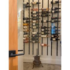 a wine rack with many bottles on it