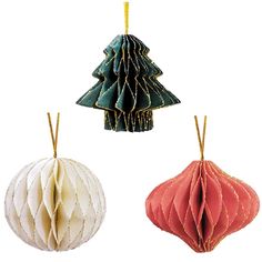 three ornament shaped like christmas trees in different colors and sizes, hanging from strings