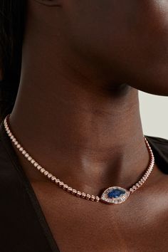 Anita Ko's necklace is modeled on classic tennis styles, which makes it endlessly wearable and timeless. It's cast from 18-karat rose gold and set with round-cut diamonds along the chain and baguette-cut ones at the pendant, framing a vibrant blue sapphire - the charm is meant to depict an evil eye, a talisman of protection against negativity. Rose Gold Diamond Cut Tennis Necklace, Formal Fine Jewelry Rose Gold Tennis Necklace, Luxury Rose Gold Tennis Necklace For Formal Occasions, Luxury Single Strand Tennis Necklace, Luxury Rose Gold Tennis Necklace With Diamond Accents, Elegant Rose Gold Necklaces With Diamond Eyes, Diamond And Sapphire Necklace, Sapphire Necklace Gold, Anita Ko Jewelry