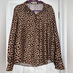 - 100% Polyester - Size 48 Or L/Xl - Button Down Long Sleeve Leopard Print Long Sleeve Top With Buttons, Leopard Print Button-up Top With Buttons, Leopard Print Button-up Top, Long Sleeve Leopard Print Top With Buttons, Leopard Print Button-up Top For Work, Fitted Leopard Print Blouse For Work, Fall Leopard Print Button-up Blouse, Polyester Blouse, Cell Phone Holster