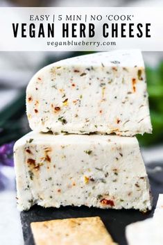 two pieces of vegan herb cheese stacked on top of each other