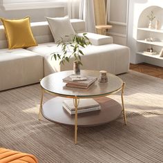 a living room with white couches and a coffee table in front of a window