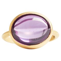 Look deep into this stunning amethyst stone and you'll find all of our secrets. Intended as a pinky ring but can be resized to any size between 2 and 10. -14k yellow gold -2mm half round band -open back setting -12x10mm cabochon amethyst stone -satin finish (polished finish available) Oval Amethyst Ring With Large Stone, Fine Jewelry, 14k Gold Round Amethyst Ring, Fine Jewelry, Classic Multi-stone Amethyst Ring In 14k Gold, Luxury Formal Amethyst Ring, Oval Cabochon, Luxury Yellow Gold Amethyst Cabochon Ring, Pinky Ring, Bling Rings, Amethyst Stone, Fashion Rings