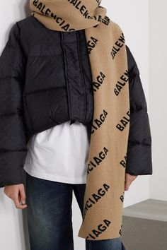 Balenciaga's logo-jacquard scarf is reworked for the season in neutral beige and black hues. Made from soft and cozy wool, it can be wrapped twice around your neck or draped around your shoulders. Luxury Jacquard Knit Winter Outerwear, Luxury Beige Scarf For Fall, Designer Wool Scarves For Winter, Designer Jacquard Knit Winter Outerwear, Designer Wool Scarves For Fall, Luxury Winter Scarves, Luxury Black Winter Scarves, Luxury Black Scarf For Fall, Luxury Brown Scarves For Winter