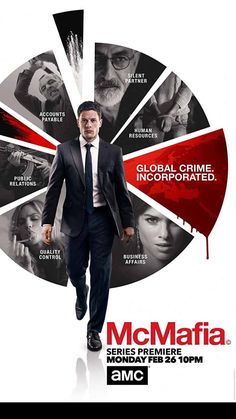 a man in a suit and tie walking through a poster for the movie mcmafia