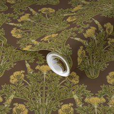 an image of a wallpaper with flowers and leaves on it's surface,