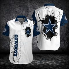 a white and blue shirt with the word cowboys on it, in front of a cracked background