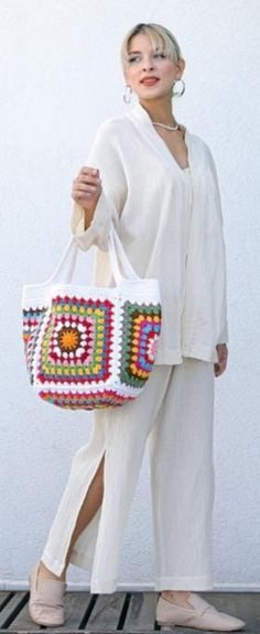 Granny square purse bag, knitted bag, Handmade bag, Multi-color bag,White bag,  shoulder bag,granny square bag, gift for her.  This product is made with cotton yarns quality knitting  (80% cotton 20% acrylic).  It is a very beautiful accessory for young girls as well as functional. It can be washed in the washing machine.  Personalized bag.  Lined bag.  *Returns and exchanges. *Shipped on the same business day or after 1 day.                              https://grandmacrochet7.etsy.com Casual White Square Crochet Bag, White Square Crochet Bag For Vacation, Rectangular White Crochet Bag For Vacation, White Square Crochet Bag For Beach, White Bohemian Crochet Bag With Large Capacity, Bohemian White Crochet Bag With Large Capacity, White Square Crochet Beach Bag, White Square Beach Bag With Large Capacity, Casual White Square Beach Bag