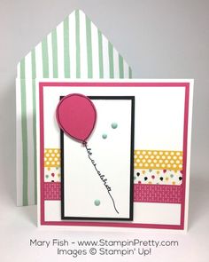 a card with a pink balloon attached to it