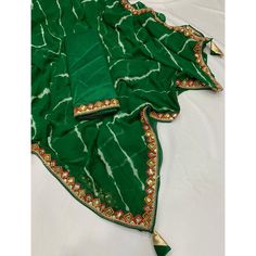 Green colored saree is made from georgette fabric which is highlighted with beautiful printed with sequince embroidered lace border work as shown. comes along unstitched banglori silk blouse piece which you can customise as per your design/style. Occasion - You can wear this saree for casual and daily and ideal for any fashionista. Note:- The actual product may differ slightly in color and design from the one illustrated in the images when compared with computer or mobile screen. Measurements: S Mobile Screen, Georgette Saree, Georgette Fabric, Lace Border, Georgette Sarees, Embroidered Lace, Blouse Piece, Surprise Gifts, Design Style