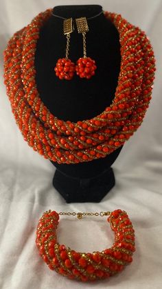 Coral Beads Necklace, (Iyun), for women, Bride, wedding, Engagement, party, traditional beads, high quality, Nigerian Coral Beads, African coral beads, Beads. 3-Rows coral beads. Mostly used - Traditional Wedding/marriage, Engagement, Baby Dedication, formal events. Contact for personalized orders  * Material: Coral Gemstones, accessories  * Handmade  * Jewelry Sets include: Necklace, Earrings and Bracelets/ Necklace and bracelet only  Kindly allow a difference of the picture/pattern of your ite Elegant Orange Red Coral Beads, Handmade Red Beaded Necklaces For Traditional Ceremonies, Elegant Red Coral Beaded Bracelets With Round Beads, Elegant Red Coral Beaded Bracelets, Handmade Gold Beaded Necklaces For Traditional Ceremonies, Red Beaded Necklaces For Traditional Ceremonies, Traditional Red Coral Beaded Necklace With Colorful Beads, Elegant Orange Beaded Necklaces For Party, Elegant Coral Polished Beads