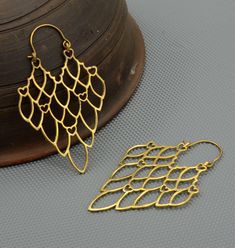 Leaf shape earring, Geometric shape earring, Bohemian earring, Brass jewellry, jewelry METAL :- Brass ❥ Customers satisfaction is our biggest priority, please contact us with any questions/queries for future or existing orders, and we will do our best to make sure you are happy with your order. ♥ Please Make Sure to Include The Correct Address During Before Order. You Can return Item within 30 Days After Successful Delivery. We Offer 100% Money Back Guarantee If You Not Satisfied With Your Purch Leaf-shaped Metal Earrings For Party, Leaf-shaped Metal Jewelry For Party, Handmade Teardrop Cartilage Earrings, Handmade Teardrop Elegant Cartilage Earrings, Handmade Elegant Teardrop Cartilage Earrings, Geometric Brass Earrings For Gift, Handmade Brass Plug Earrings For Parties, Elegant Handmade Teardrop Cartilage Earrings, Geometric Metal Earrings With Ear Wire